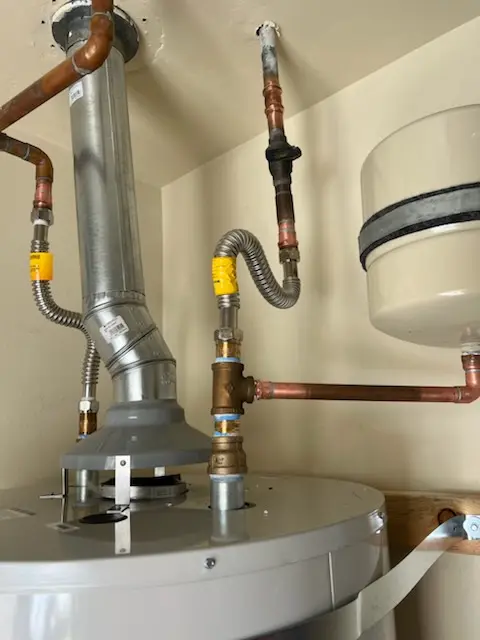 Water heater installation and plumbing repair in Portage